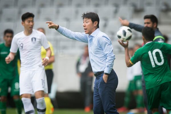 El técnico surcoreano Shin Tae-yong asumió el equipo hace un año para lograr la clasificación dejando los pelos en el alambre. AFP