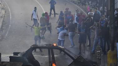 Cuatro muertos en disturbios antes de marchas en Venezuela