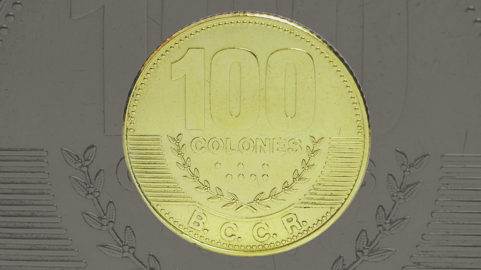 Nueva moneda de ¢100 con tema de swing criollo se suma al nuevo cono monetario y da inicio a una serie cultural del BCCR.