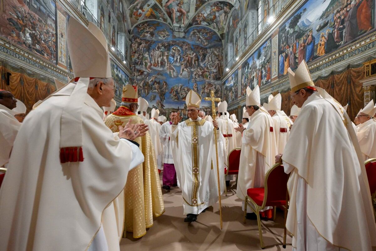 This photo taken and handout on May 9, 2025 by The Vatican Media shows Pope Leo XIV during a mass with cardinals in the Sistine Chapel in The Vatican. (Photo by Handout / VATICAN MEDIA / AFP) / RESTRICTED TO EDITORIAL USE - MANDATORY CREDIT "AFP PHOTO / VATICAN MEDIA" - NO MARKETING - NO ADVERTISING CAMPAIGNS - DISTRIBUTED AS A SERVICE TO CLIENTS