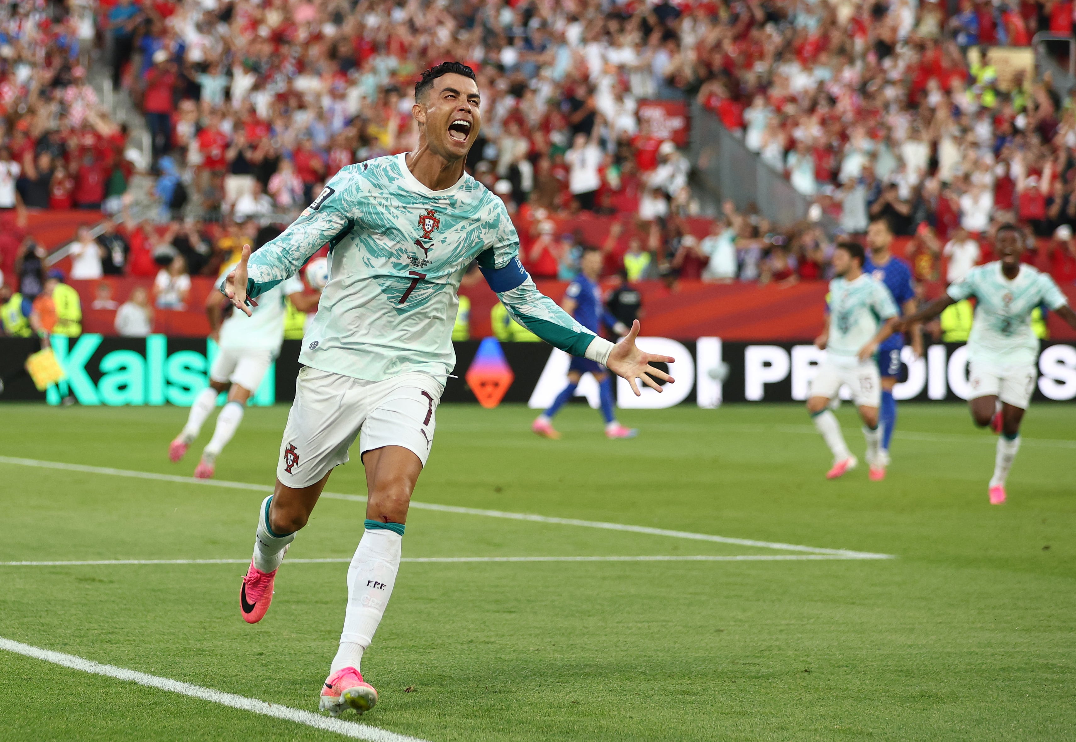 Portugal's forward #07 Cristiano Ronaldo celebrates after scoring his team's first goal from the penalty spot during the 2026 World Cup round of 32 football match between Portugal and Croatia at the Toronto Stadium in Toronto on July 2, 2026. (Photo by Cole Burston / AFP)