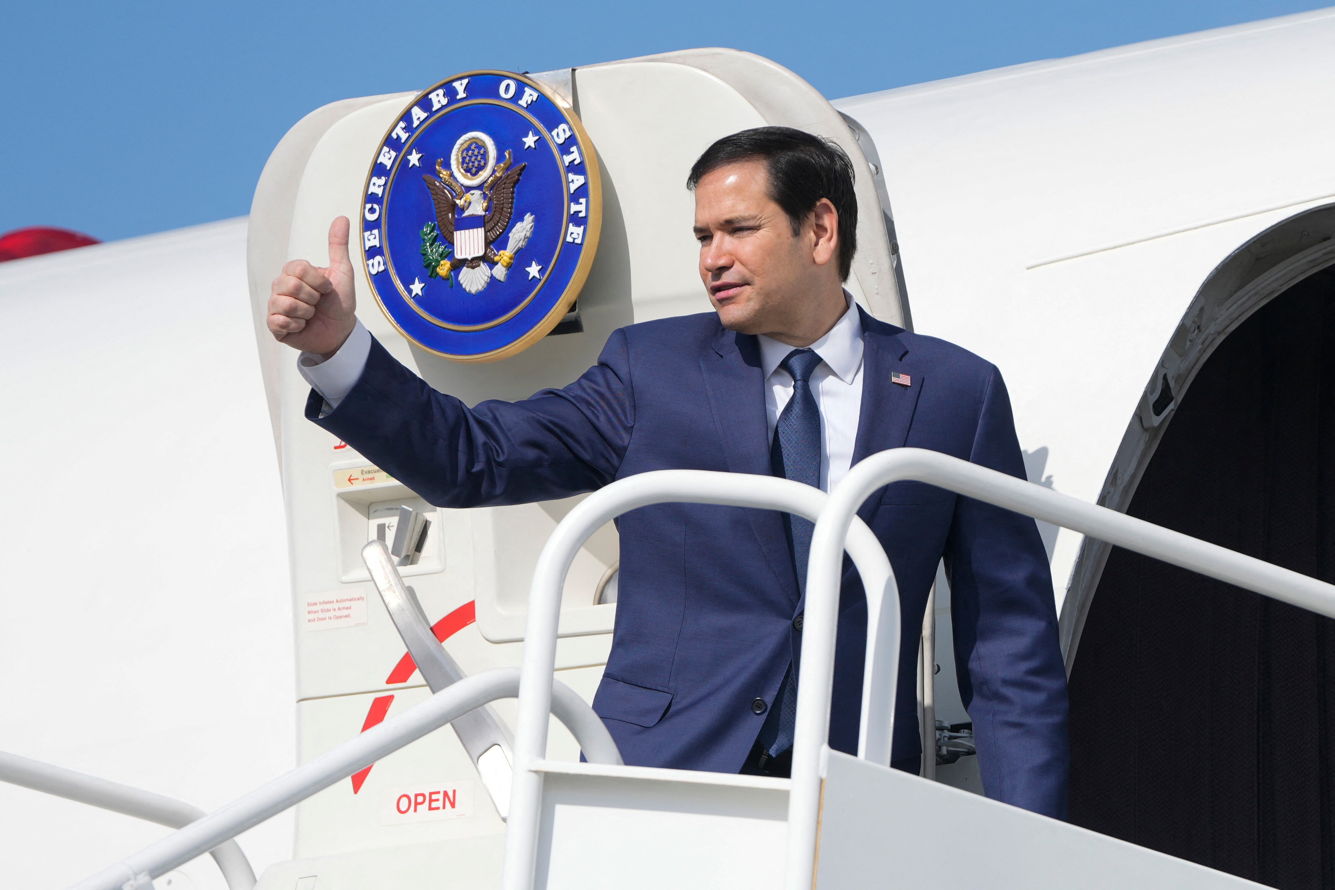 US Secretary of State Marco Rubio boards a plane en route to El Salvador at Panama Pacifico International Airport in Panama City on February 3, 2025. Rubio is in Panama on a two-day official visit. (Photo by Mark Schiefelbein / Pool AP / AFP)