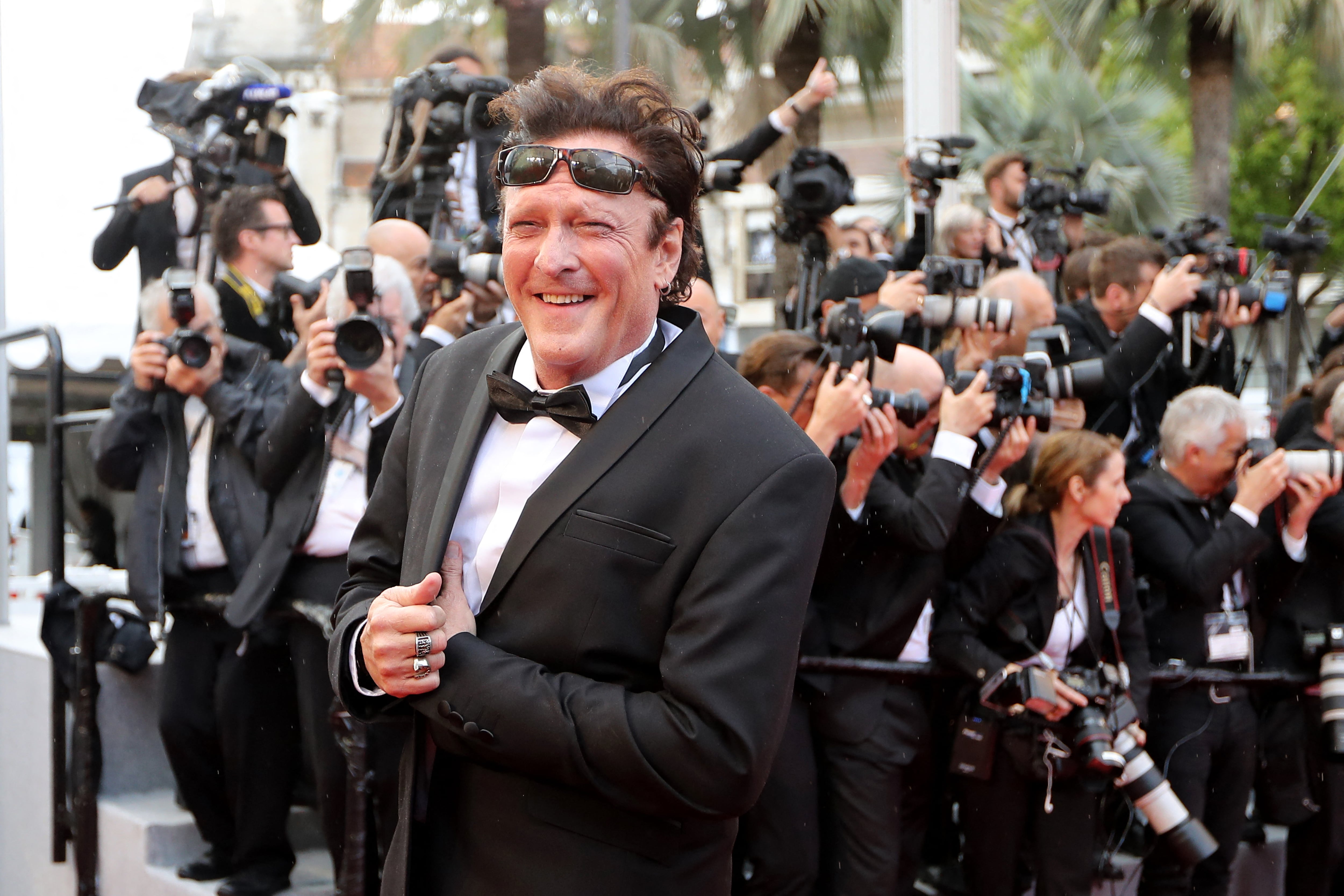 US actor Michael Madsen poses as he arrives on May 14, 2018 for the screening of the film "BlacKkKlansman" at the 71st edition of the Cannes Film Festival in Cannes, southern France. (Photo by Valery HACHE / AFP)