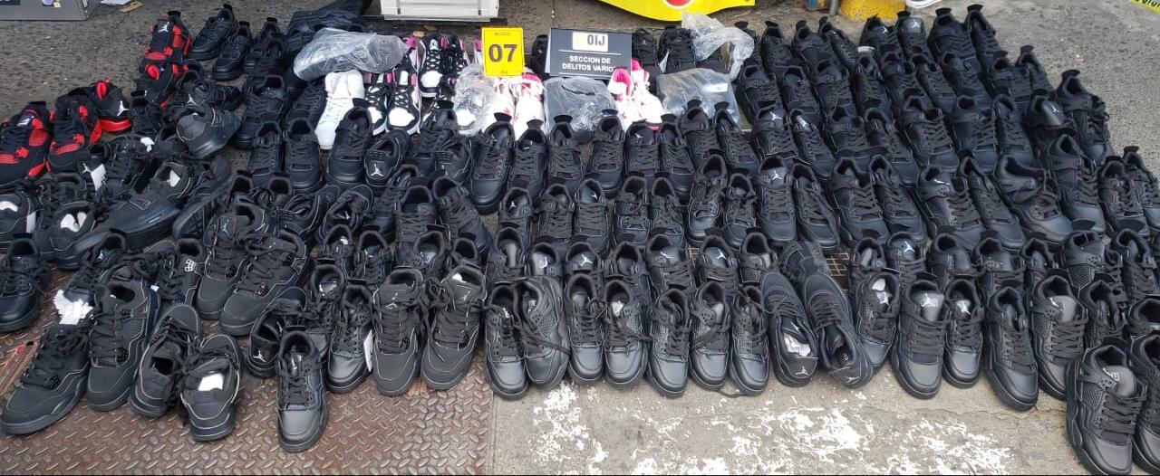 Allanamientos en San José por venta de productos falsificados. Foto OIJ.