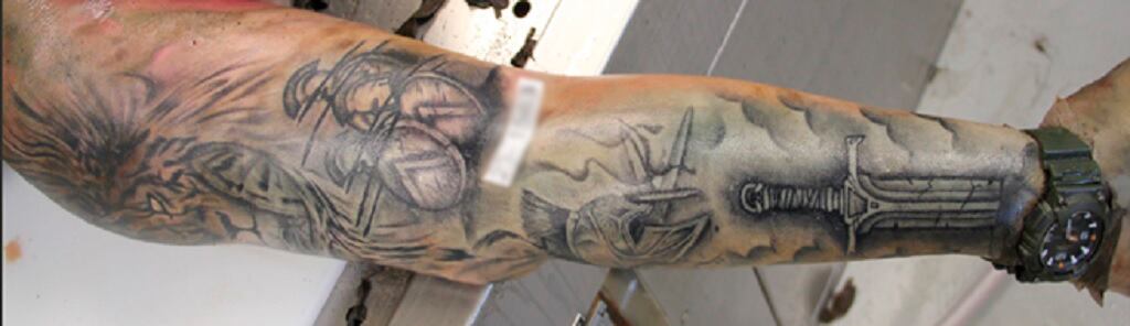 Tatuajes serían claves para identificar cuerpo hallado en Quepos. Foto OIJ.