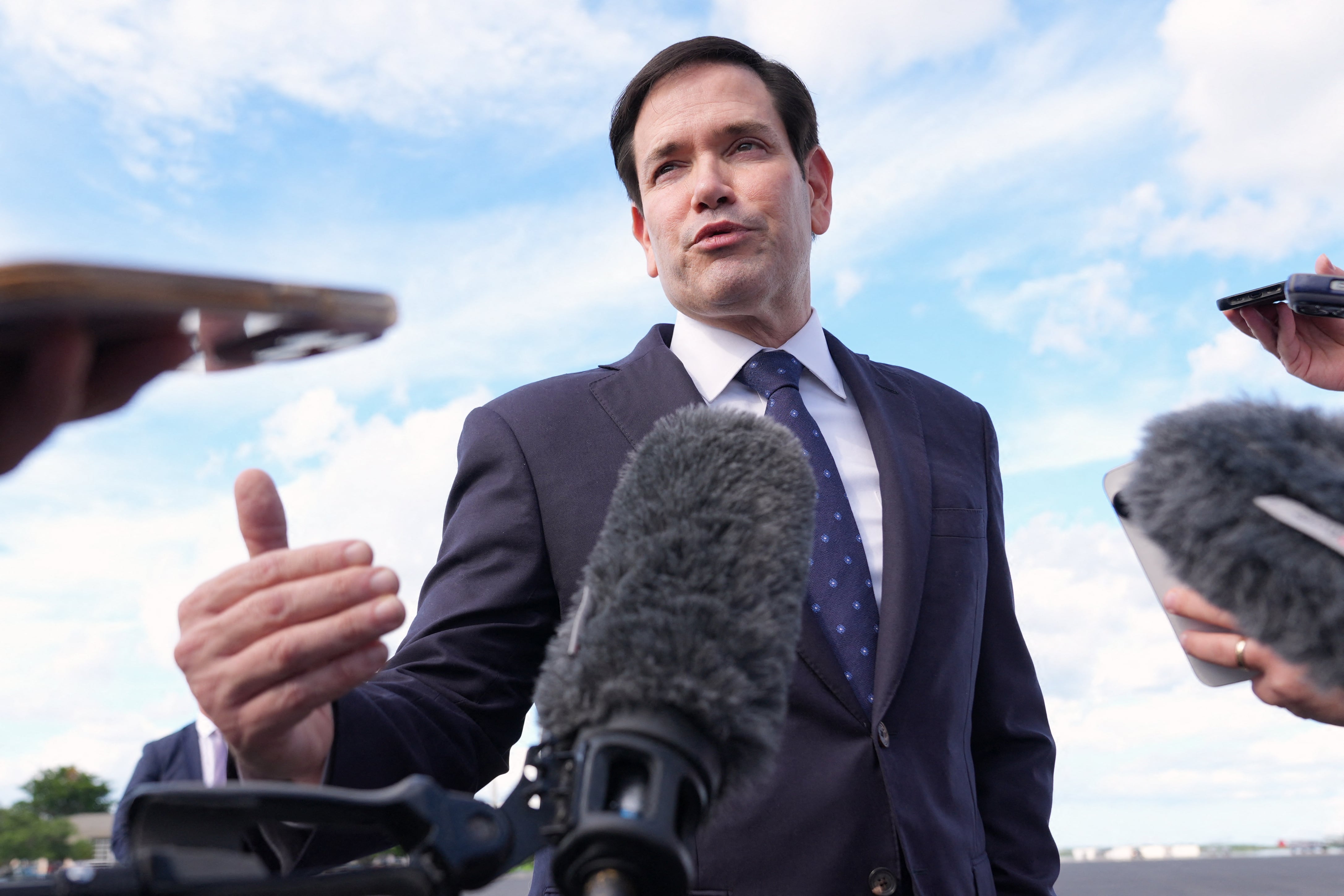 US Secretary of State Marco Rubio speaks to reporters before boarding his plane at Homestead Air Reserve Base in Homestead, Florida, en route to Mexico City, on September 2, 2025. US Secretary of State Marco Rubio headed Tuesday on his first trip in office to Mexico, which has so far succeeded in navigating treacherous terrain with President Donald Trump who wants tough action on migration and cartels. (Photo by Jacquelyn Martin / POOL / AFP)