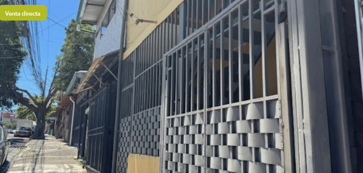 Terreno con construcción en Pavas