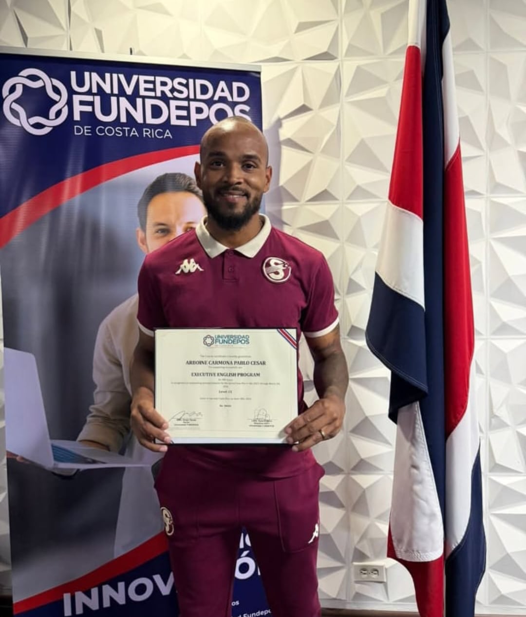 Arboine con su título de inglés