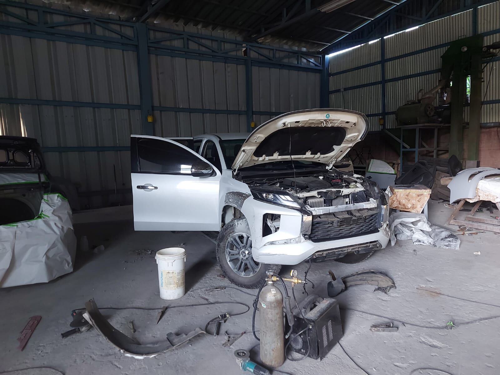 OIJ decomisa 12 vehículos en Alajuela que al parecer fueron robados. Foto OIJ.