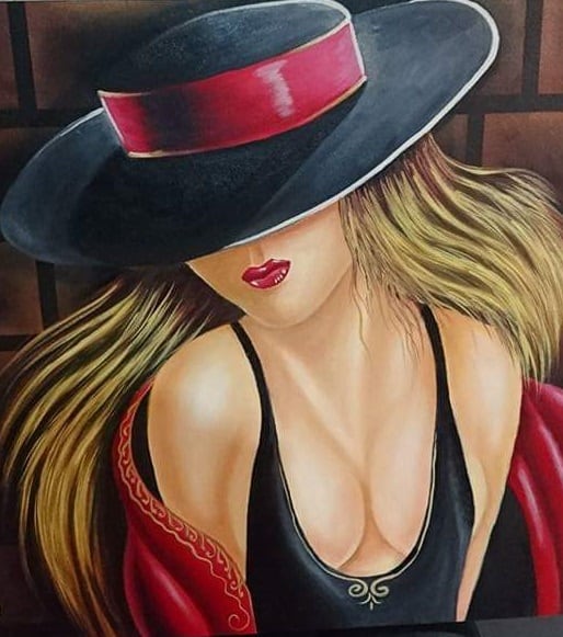 Minerva Hernández dona cuadros a fundaciones que ayudan a perros. Salvó la vida de Mila.