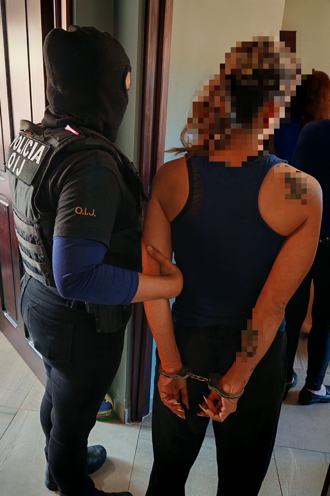 La mujer fue detenida en su casa en Desamparados de Alajuela. Foto OIJ.