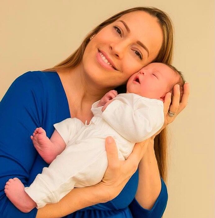 Exmodelo y presentadora Kathryn Arbenz y sus hijos.