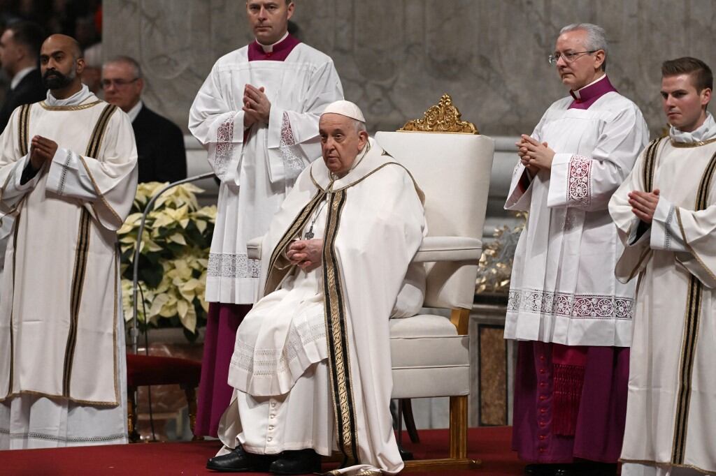 Pope Francis presides the Christmas Eve mass at  St. Peter's Basilica in the Vatican on December 24, 2023. (Photo by Tiziana FABI / AFP)