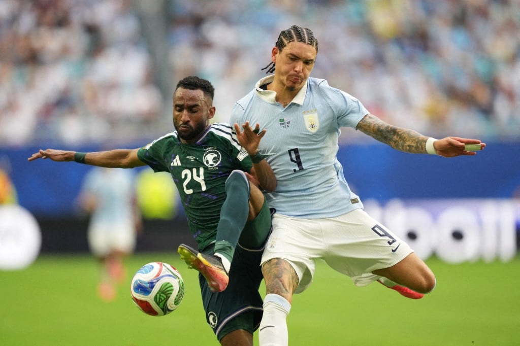 FLORIDA, USA - JUNE 15: Darwin Nunez (9) of Uruguay in action against Moteb Al-Harbi (24) of Saudi Arabia during the 2026 FIFA World Cup First Stage Group H match between Saudi Arabia and Uruguay at Hard Rock Stadium (Miami Stadium) in Miami Gardens, Florida, United States on June 15, 2026. Evrim Aydin / Anadolu (Photo by Evrim Aydin / Anadolu via AFP)