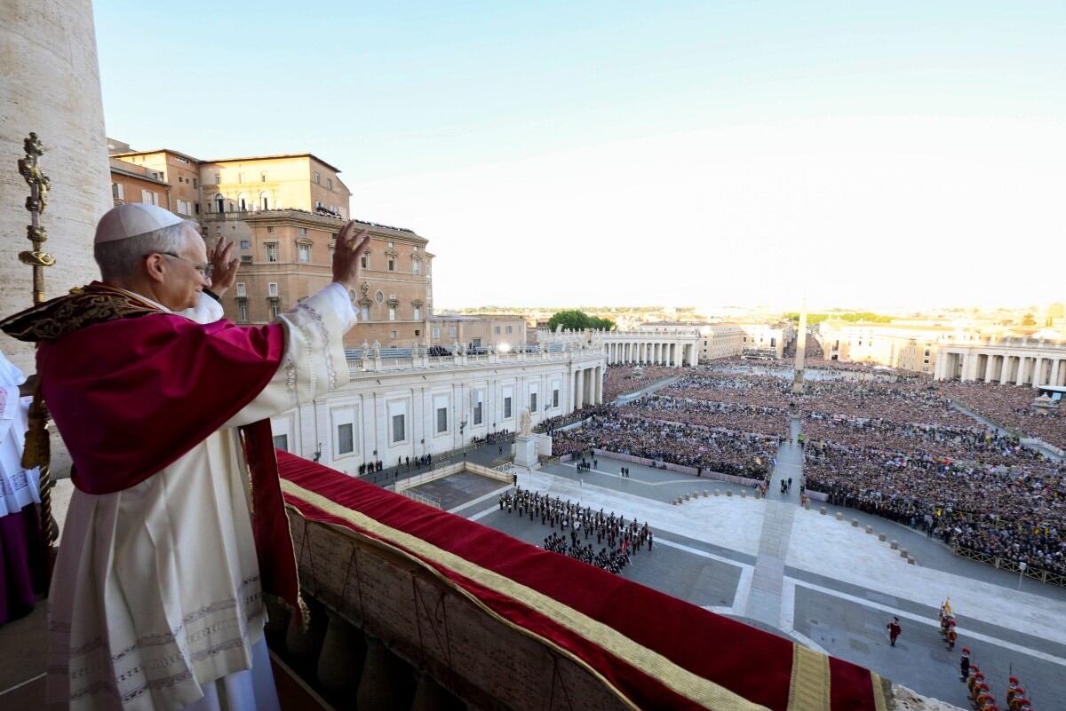 Newly elected Pope Leo XIV, Robert Prevost addresses the crowd from the main central loggia balcony of the St Peter's Basilica for the first time, after the cardinals ended the conclave, in The Vatican, on May 8, 2025. Robert Francis Prevost was on Thursday elected the first pope from the United States, the Vatican announced. A moderate who was close to Pope Francis and spent years as a missionary in Peru, he becomes the Catholic Church's 267th pontiff, taking the papal name Leo XIV. (Photo by Tiziana FABI / AFP)