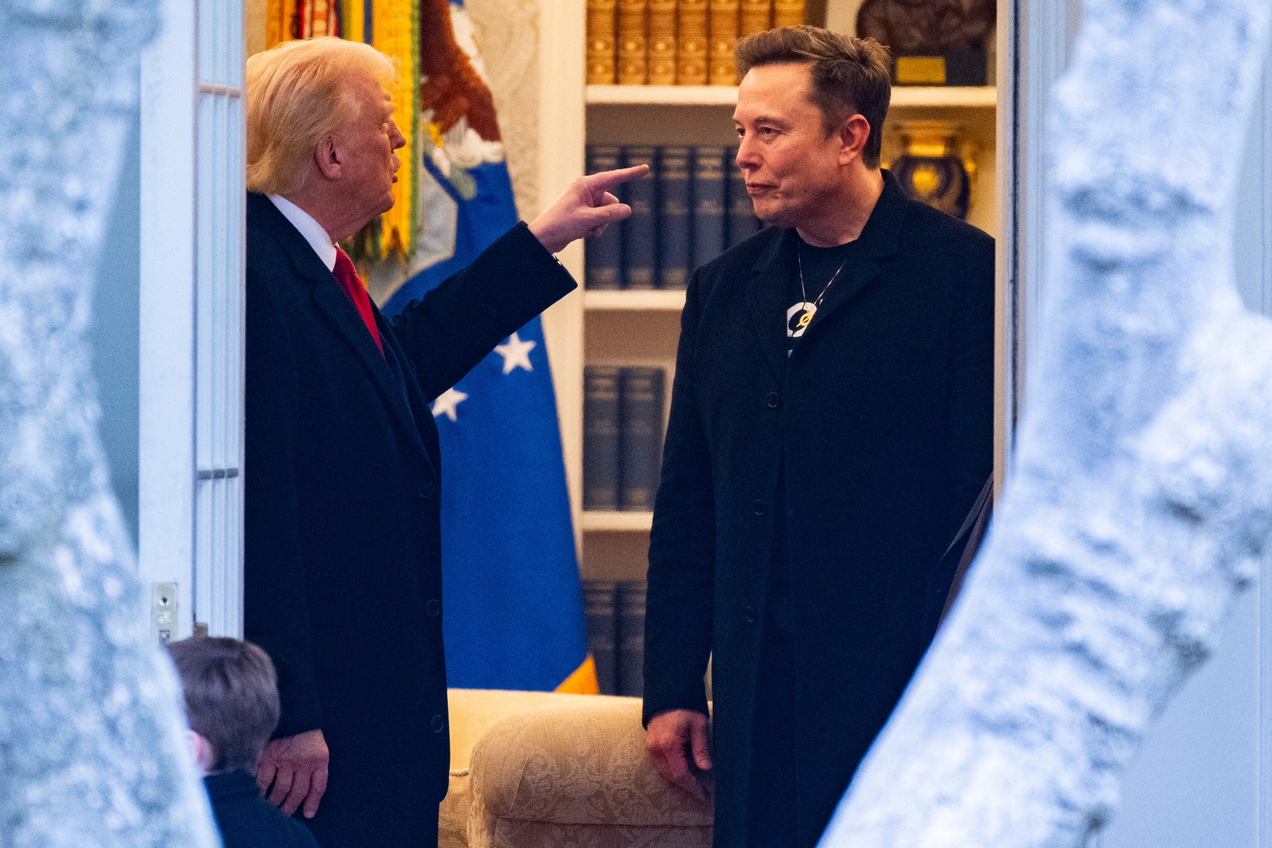 US President Donald Trump and Elon Musk (R) speak before departing the White House on his way to his South Florida home in Mar-a-Lago in Florida on March 14, 2025. Trump is spending the weekend at his Florida Mar-a-Lago resort. (Photo by ROBERTO SCHMIDT / AFP)