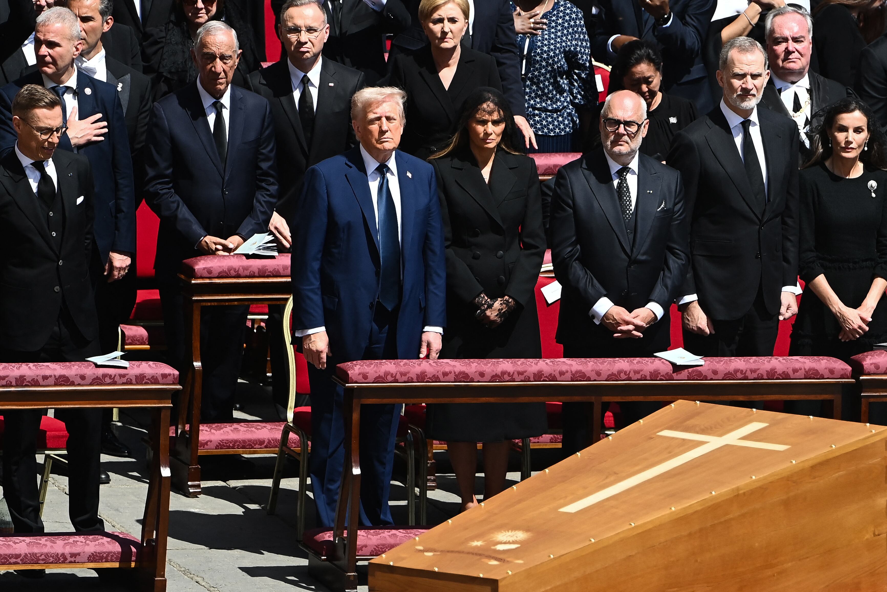 (1st ROW - L TO R) Finland's President Alexander Stubb, US President Donald Trump and his wife Melania Trump, Estonia's President Alar Karis, Spain's King Felipe VI ans his wife Spain's Queen Letizia, Poland's President Andrzej Duda (C), Philippines' First Lady Liza Araneta Marcos (R2) observe the coffin of late Pope Francis during the funeral ceremony at St Peter's Square in The Vatican on April 26, 2025. (Photo by Isabella BONOTTO / AFP)