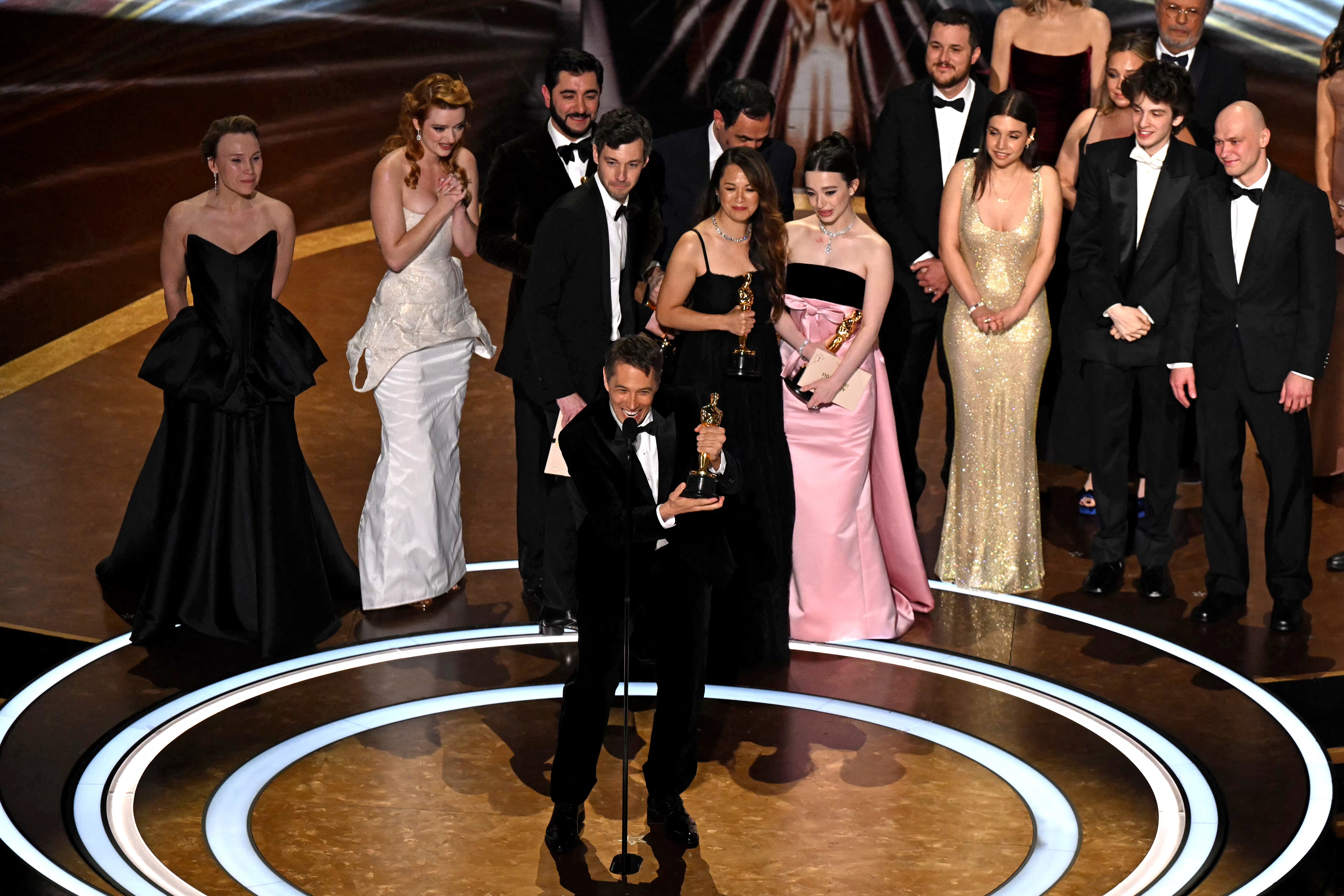 US filmmaker Sean Baker accepts the award for Best Picture for "Anora" onstage during the 97th Annual Academy Awards at the Dolby Theatre in Hollywood, California on March 2, 2025. (Photo by Patrick T. Fallon / AFP)