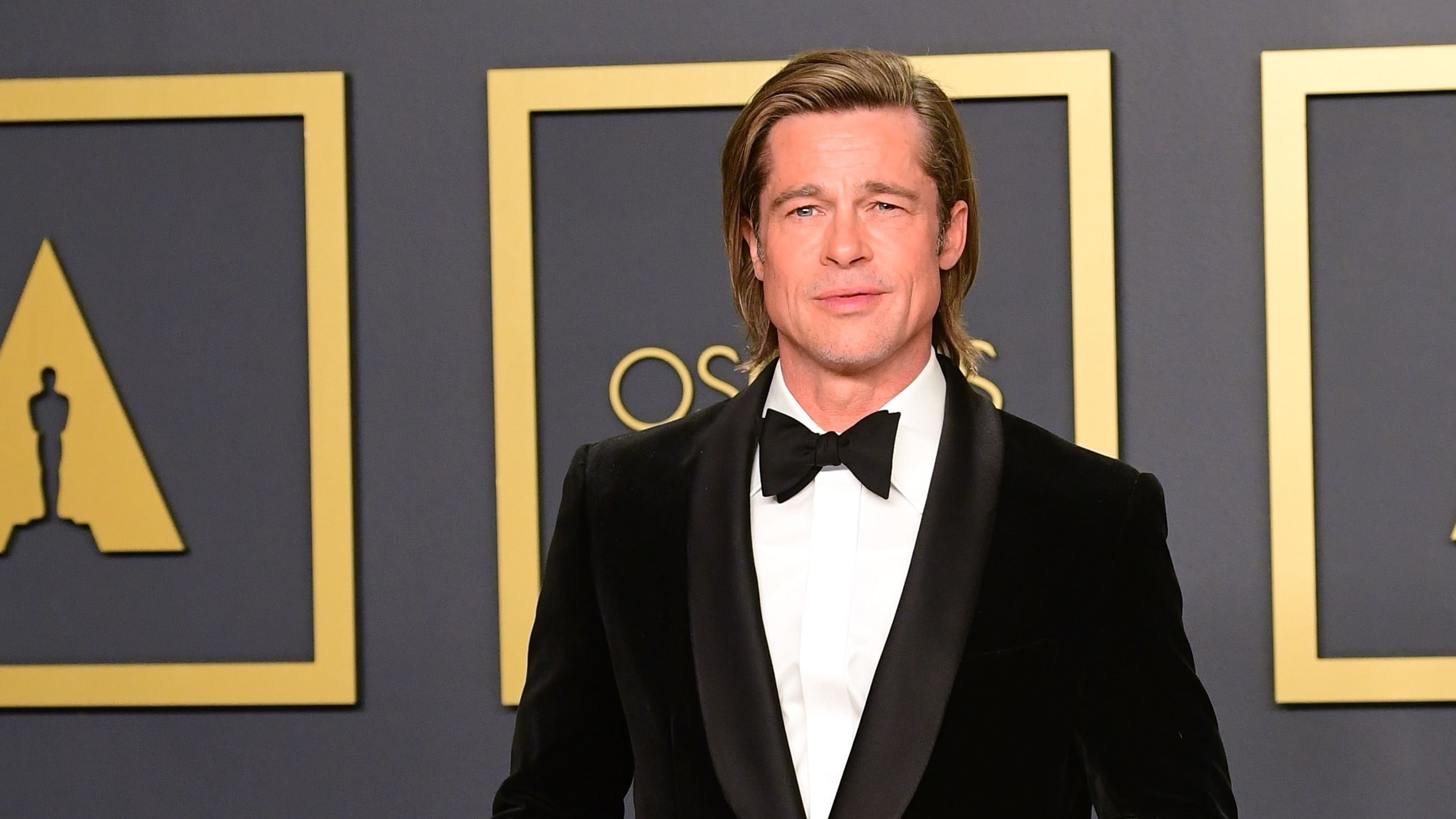 Actor Brad Pitt poses in the press room with the Oscar for Best Supporting Actor during the 92nd annual Oscars at the Dolby Theater in Hollywood, California on February 9, 2020. (Photo by FREDERIC J. BROWN / AFP)