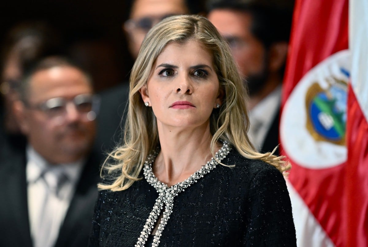 Costa Rica's president-elect Laura Fernandez attends a press conference by President Rodrigo Chaves after his final State of the Nation address at the Legislative Assembly in San Jose on May 4, 2026. (Photo by Ezequiel BECERRA / AFP)