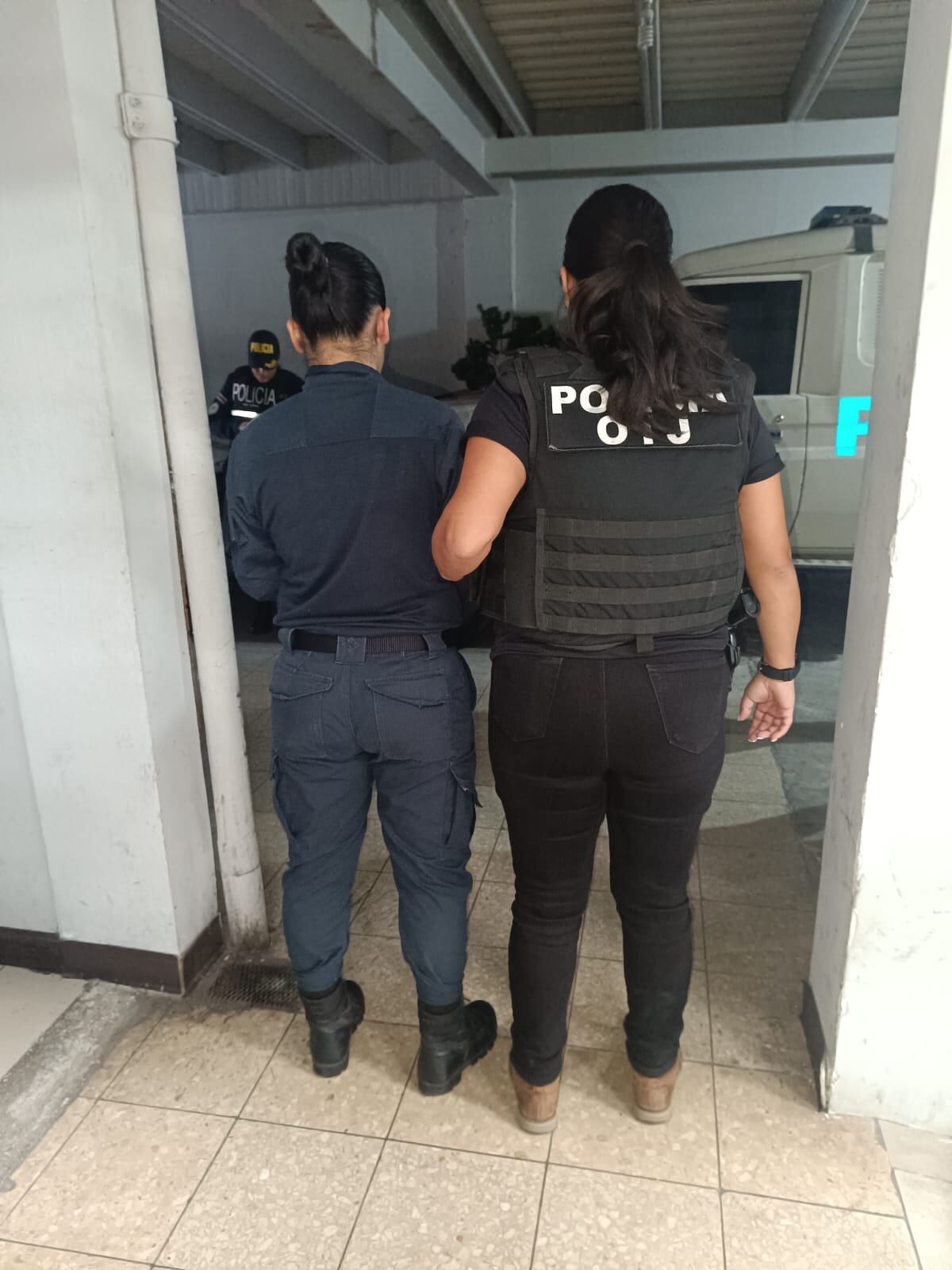 Policías detenidos por homicidio en celda en delegación de Pavas. Foto OIJ.