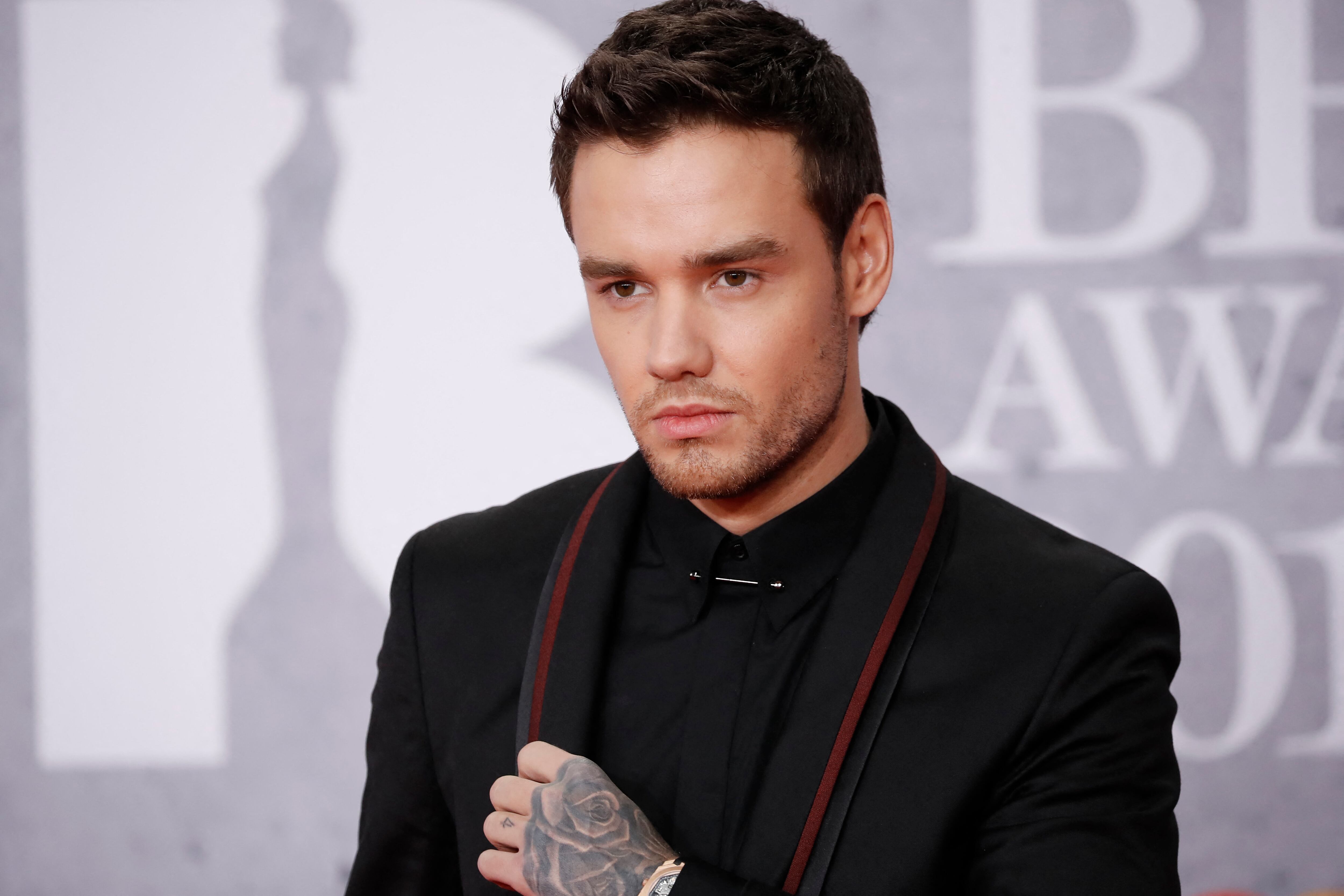 (FILES) British singer-songwriter Liam Payne poses on the red carpet on arrival for the BRIT Awards 2019 in London on February 20, 2019. Liam Payne, who died aged 31 after plunging from a hotel balcony in Buenos Aires, on October 16, 2024 spent more than half his life in the public eye as a member of one of the world's most successful boy bands. (Photo by Tolga AKMEN / AFP) / RESTRICTED TO EDITORIAL USE � NO POSTERS � NO MERCHANDISE� NO USE IN PUBLICATIONS DEVOTED TO ARTISTS