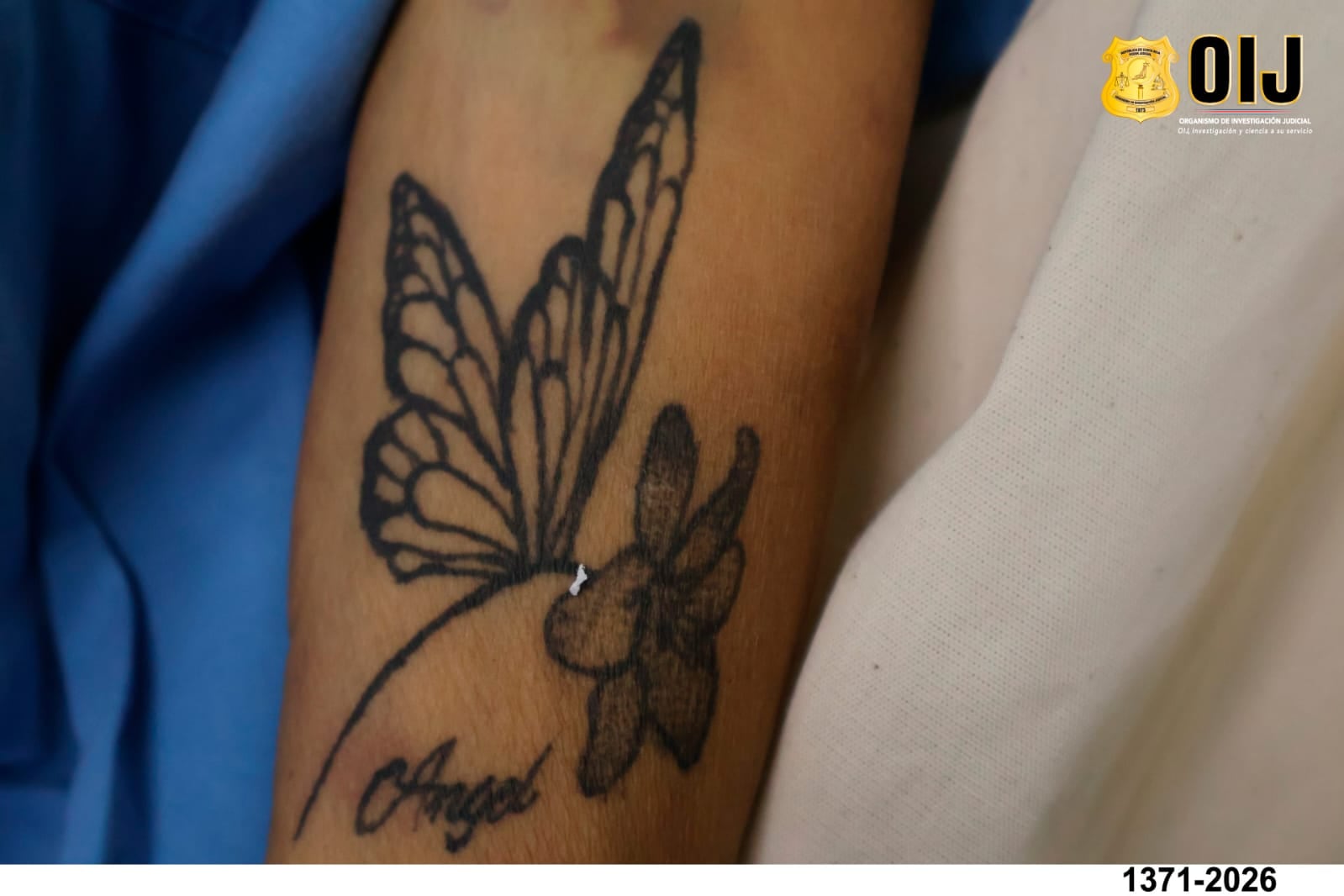 Estos son los tatuajes encontrados en el cuerpo de la mujer. Foto OIJ.